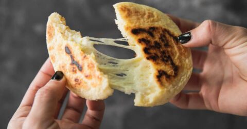 image of stretchy cheese in pupusa, lab-grown dairy